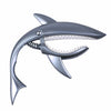 A silver pro-grade zinc alloy guitar capo with a shark-like body and serrated teeth.