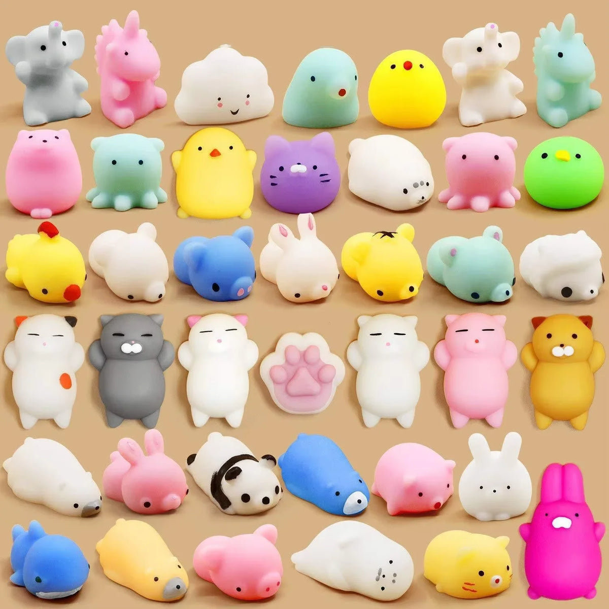A collection of eighteen soft, squishy animal stress relief toys in various pastel colors and shapes.