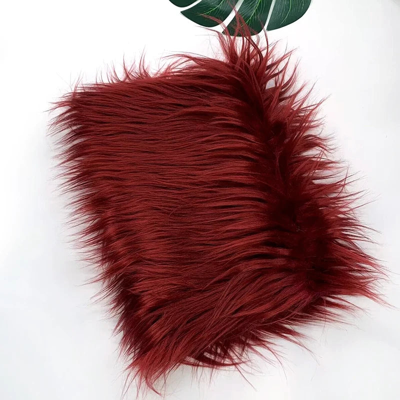 A swatch of deep reddish-brown faux fur fabric used for DIY sewing, doll hair, or cosplay.