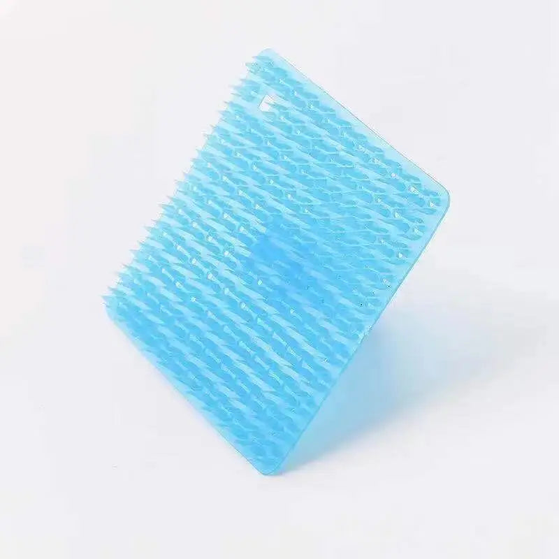 Un set de tampons à vaisselle en silicone bleu vif et brosse à fissures à poils texturés.