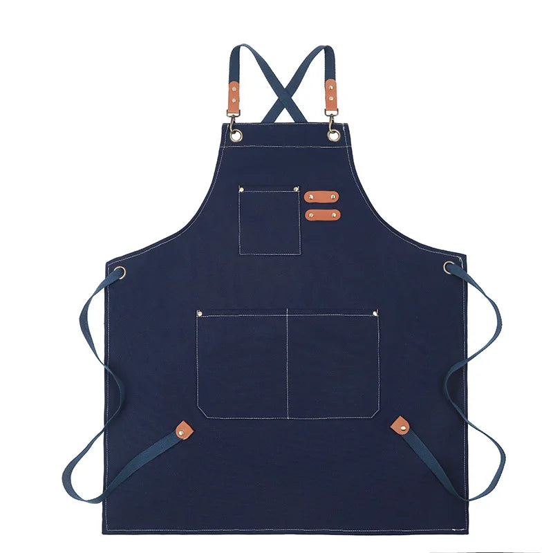Navy professional chef apron with cross-back straps and tool pockets