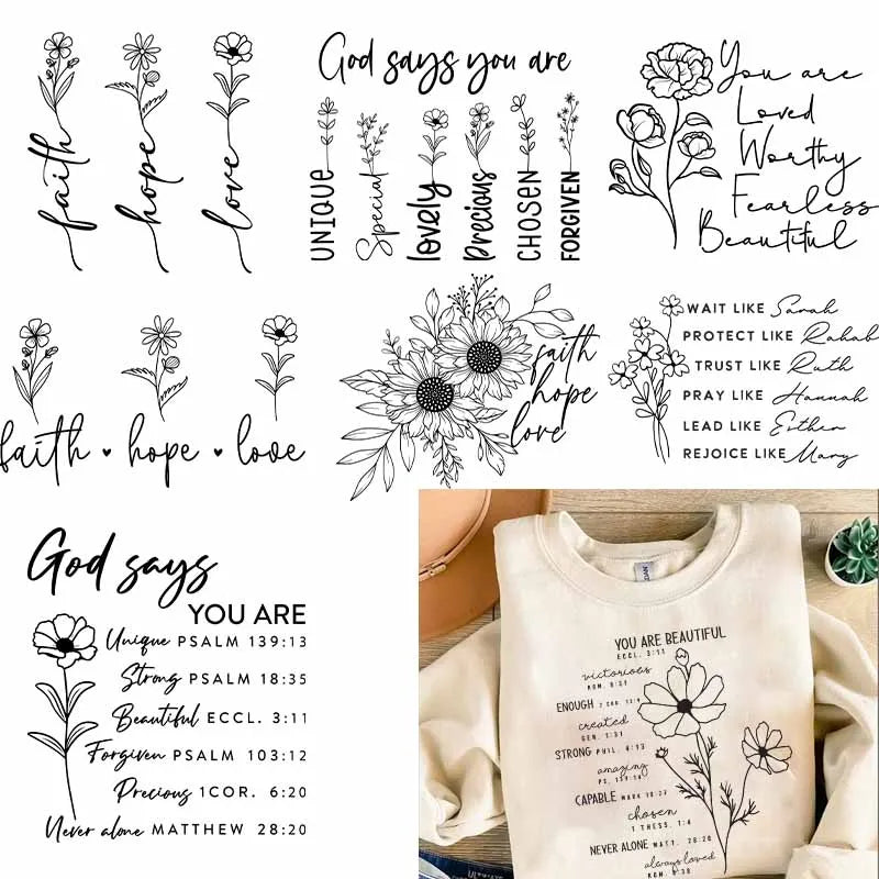 A collection of script words like faith hope love and forgiven arranged with floral illustrations.