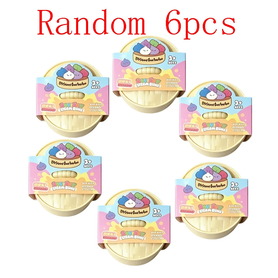 Ein Set von sechs zufälligen glitzernden Squishy-Dumpling-Sensorikspielzeugen in verschiedenen Farben und Designs.