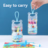 A hand holds a clear plastic container of washable art markers for kids with cute animal ears on the lid.