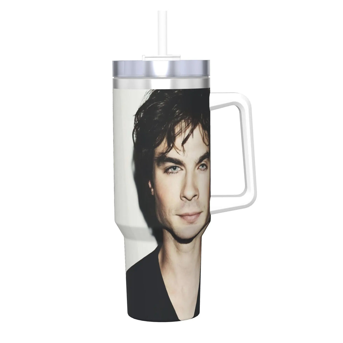 A clear insulated stainless steel tumbler with a silver straw lid featuring a portrait of a man.