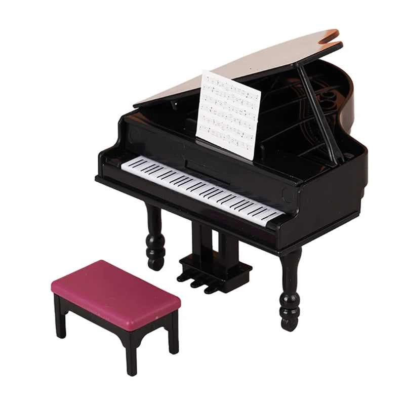A black 1:12 scale dollhouse piano with a lid open and a pink bench beside it.
