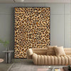A close-up of leopard print self-adhesive wallpaper on a wall, displayed in a modern interior setting.