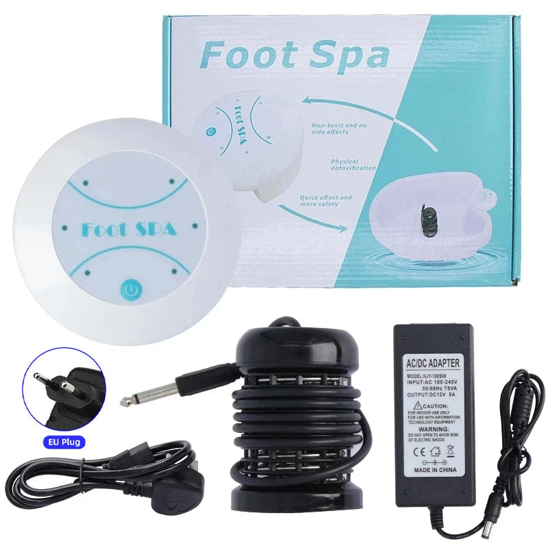 A white ionic foot spa device with a black adapter and power cord shown next to its packaging.