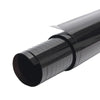 A close-up view of a black car window privacy film roll.
