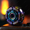 A close-up shot of a metallic fidget spinner with iridescent purple and blue accents resting on a dark surface.