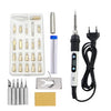 A kit of wood burning and soldering pens including various tips, a heating device, and a gold-colored filler rod.