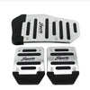 Two silver aluminum pedal covers with black anti-skid rubber grips for manual cars