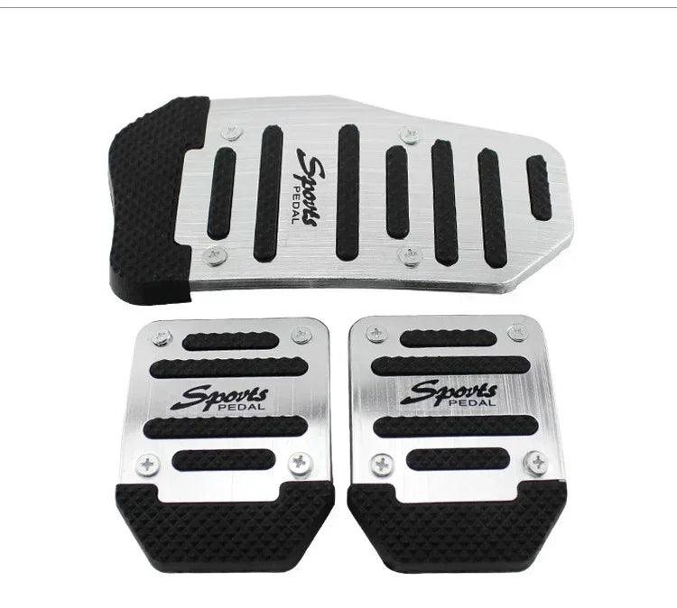 Two silver aluminum pedal covers with black anti-skid rubber grips for manual cars
