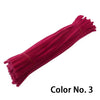 A vibrant magenta chenille craft stem with a fuzzy texture.