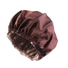 A brown satin sleep bonnet with a gathered top and elasticized edge.