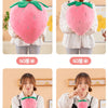 A collection of strawberry plush throw pillows in various sizes, including 60cm, 40cm, 20cm, and 10cm.
