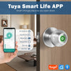 A hand holds a smartphone displaying the Tuya Smart Life App interface next to a modern fingerprint door lock.