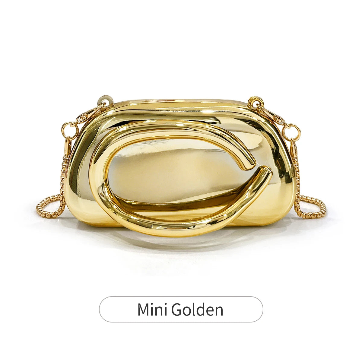 A small, shiny gold metal clutch bag with a curved design.