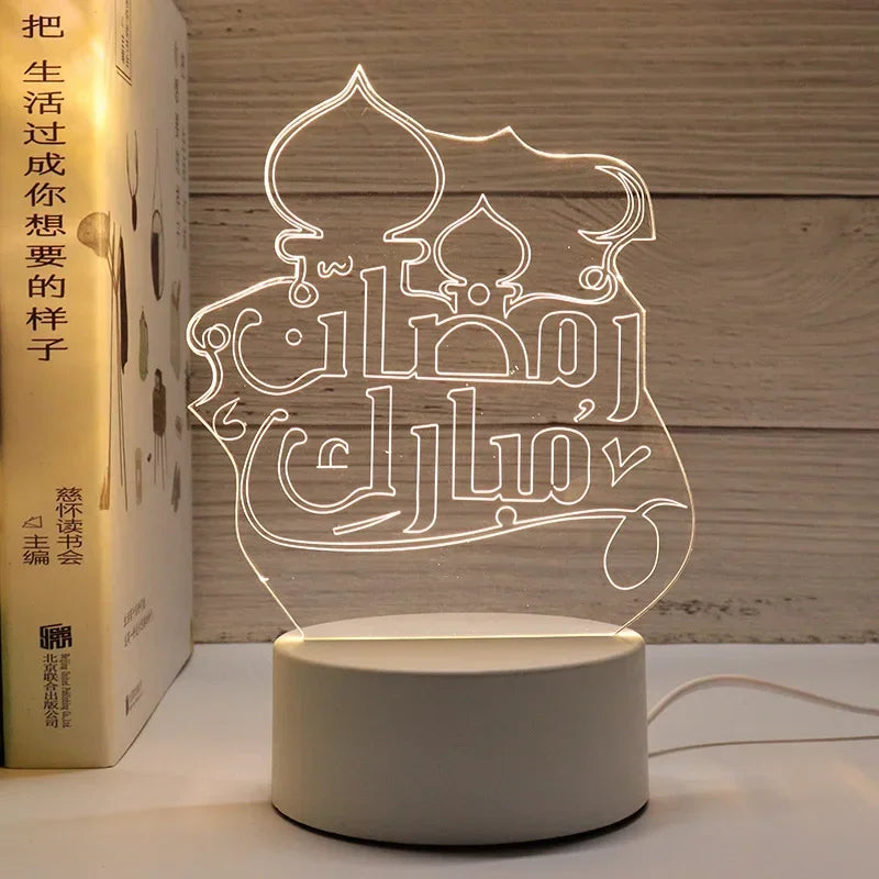 A glowing acrylic night light shaped like an ornate Islamic calligraphy design, powered by a USB cable.