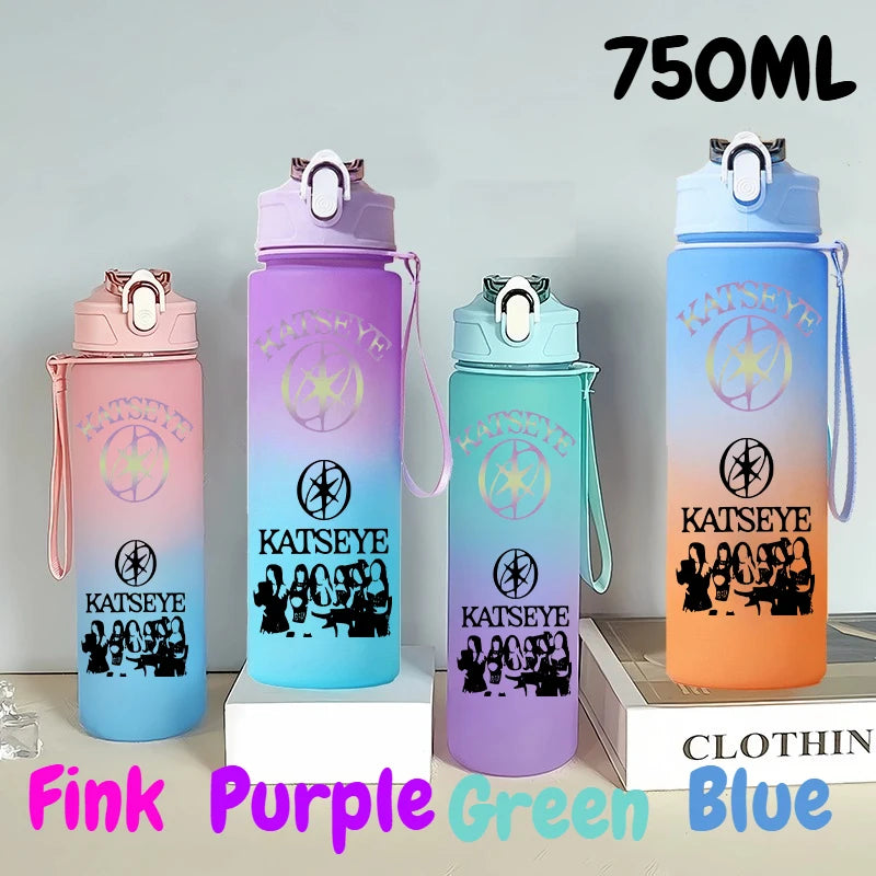 A collection of 750ml portable sports water bottles in pink, purple, green, and blue colors.