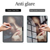 Two examples of an anti glare glass screen protector for an iPad showing a woman's face.