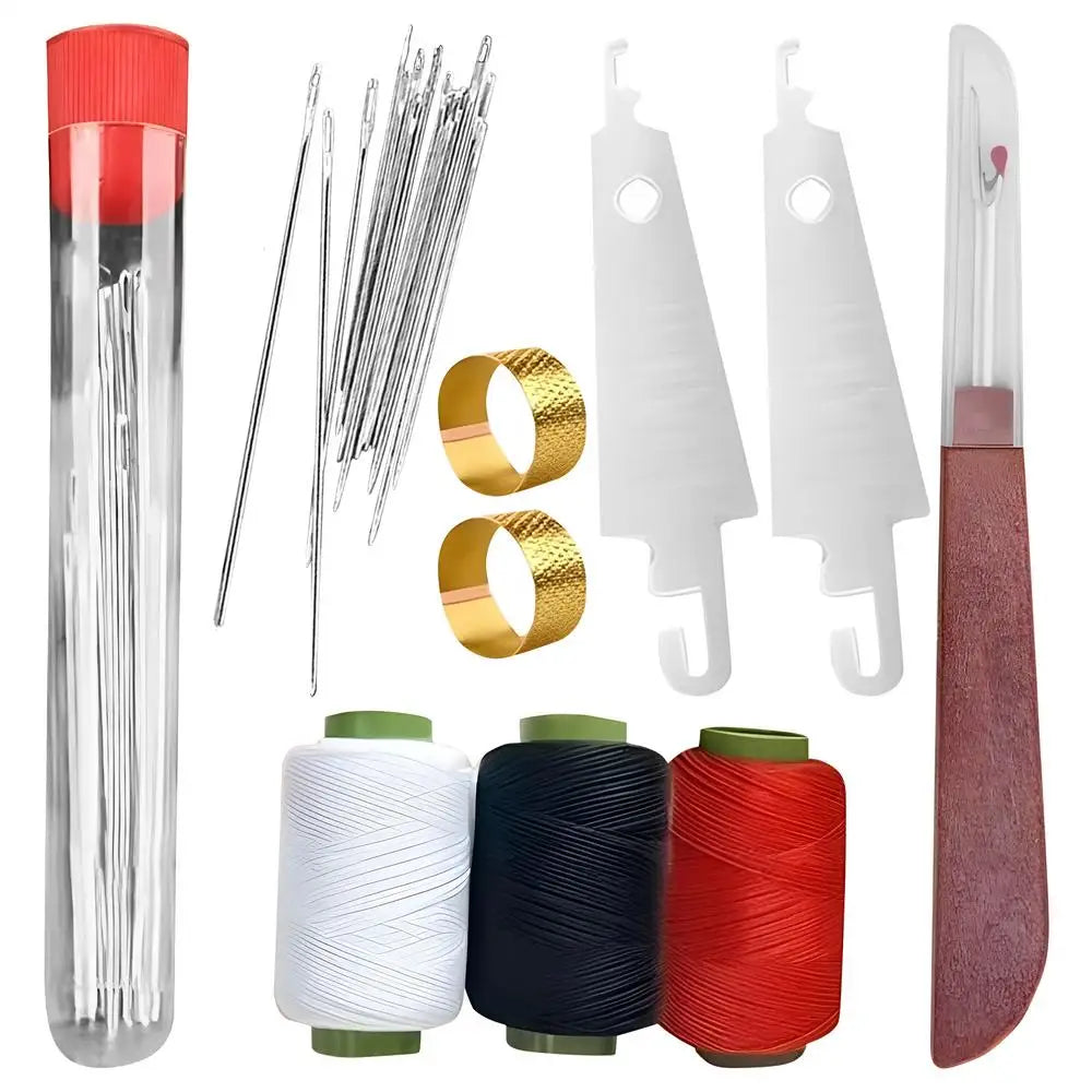 A collection of sewing tools including needles, scissors, and thread spools in various colors.