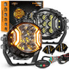 A set of Auxbeam V-Ultra series LED driving lights with amber DRL and side shooter features displayed on a black background.