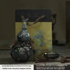 Handcrafted ceramic gourd wine set featuring a bottle, pot, and cup with a net bag.