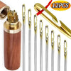 A set of 12 gold-tipped sewing needles with side holes housed in a wooden casing and featuring a gold-colored tool.