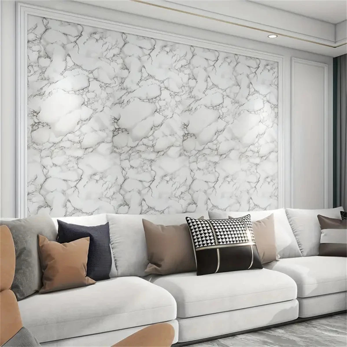 A modern living room wall featuring white marble patterned wallpaper and a light gray sofa.