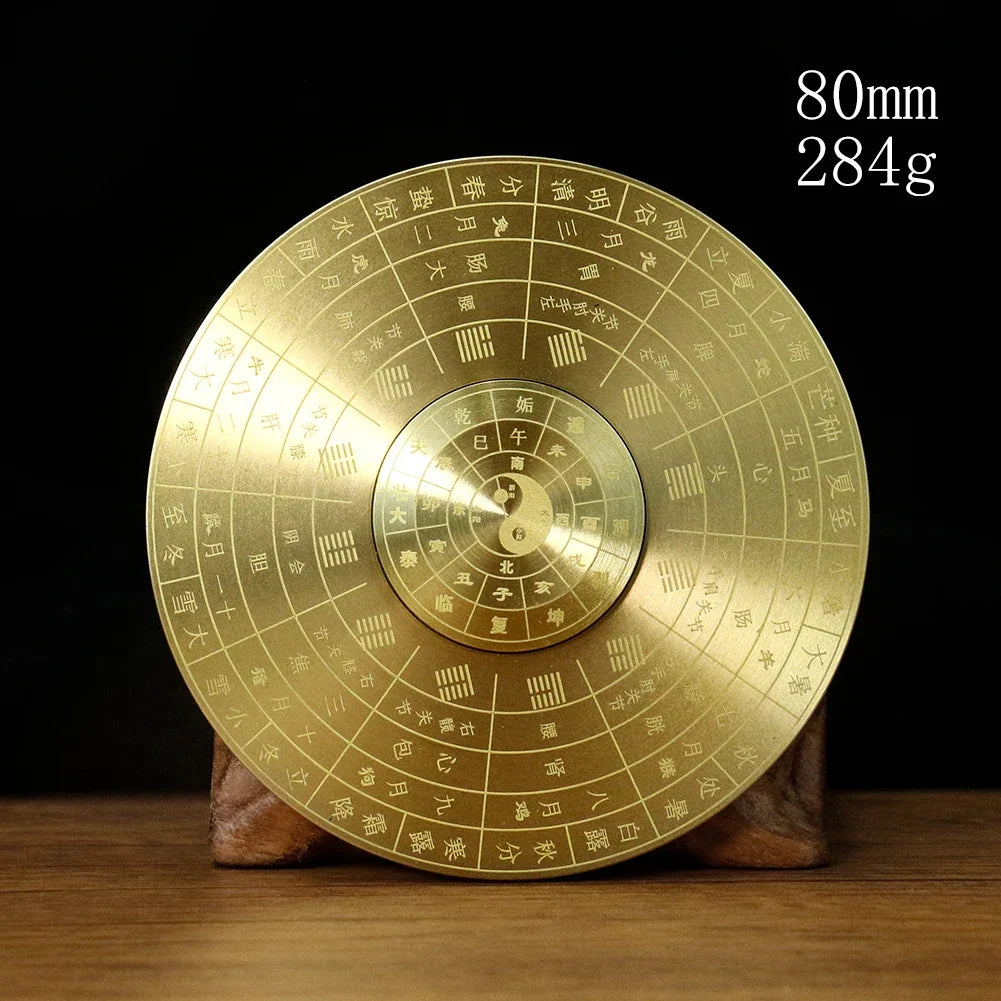 Solid brass Feng Shui compass with Yin Yang and eight trigrams, measuring 80mm and weighing 284g.
