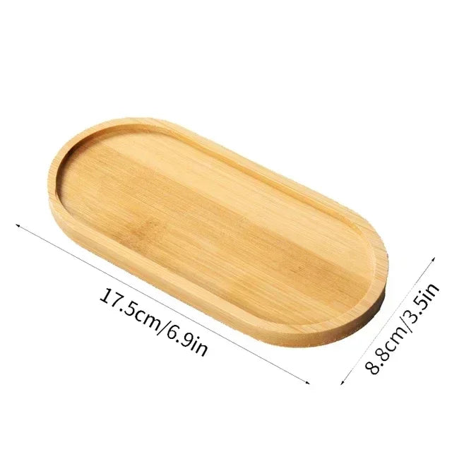Light wood serving tray or shallow dish with dimensions 17.5cm by 8.8cm.