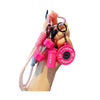 A hand holds a pink fitness keychain featuring a pink strap and multiple pink and black charms.