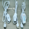 A white USB LED light board with a remote control and touch dimming features, shown with its cables.