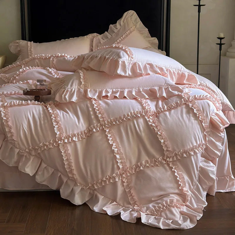 Pink ruffled duvet cover set with matching pillowcases made of soft polyester bedding