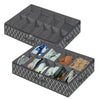 A black under-bed shoe storage organizer with a diamond pattern, featuring multiple compartments for storing shoes.