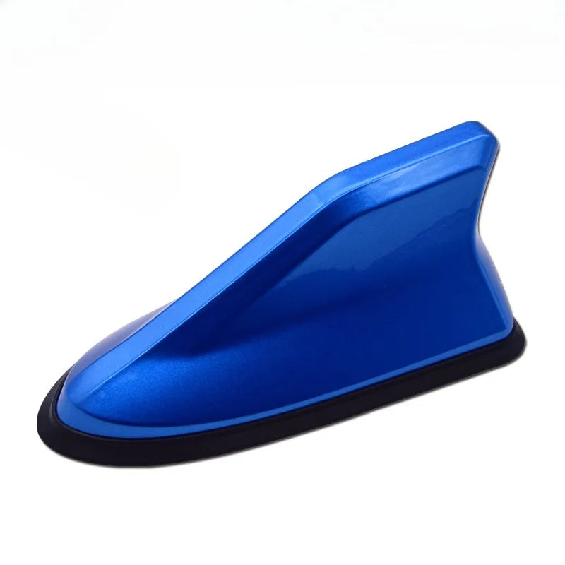 Blue aerodynamic shark fin car antenna with signal amplifier