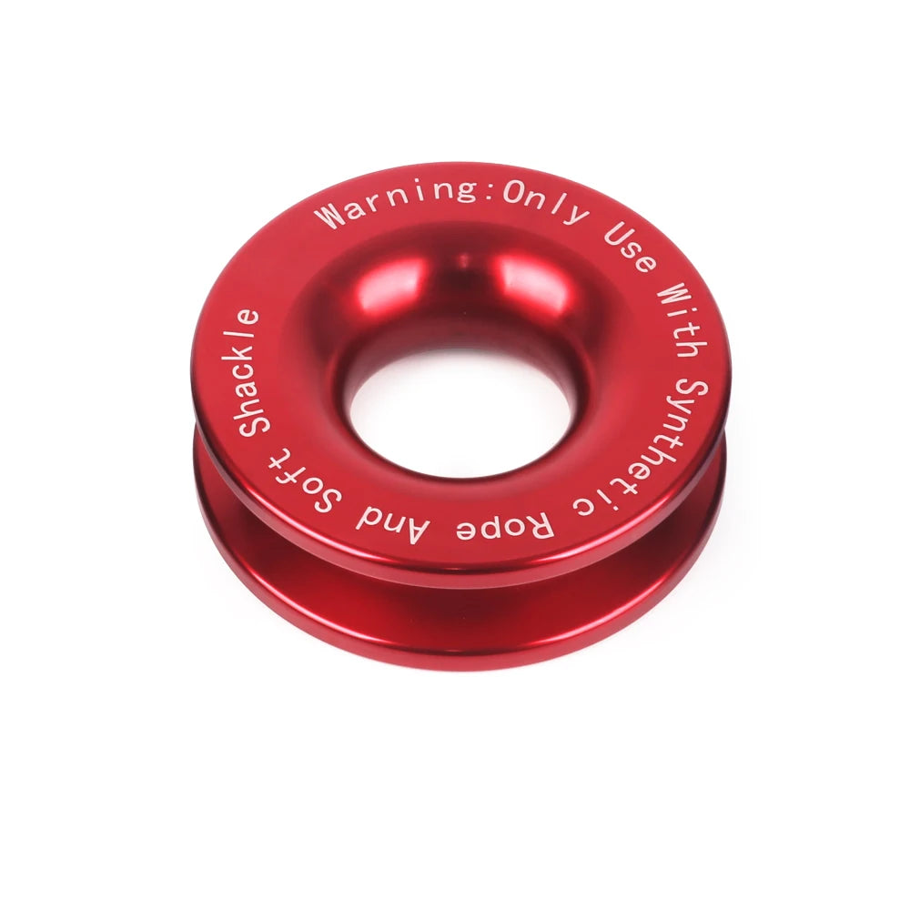 A red recovery ring with a warning label for use with synthetic rope and shackle.