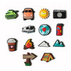 A set of various PVC pins featuring themes like a military vehicle, a sun, a bus, a camera, a city map, a coffee cup, mountai