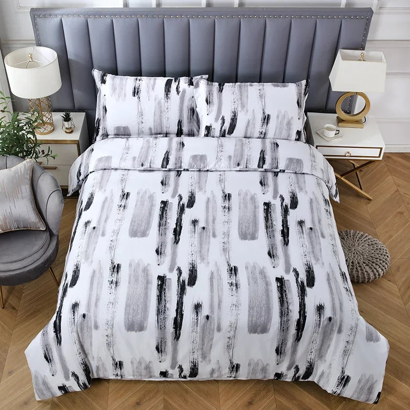 A white and black abstract striped duvet cover set with pillows displayed on a bed.