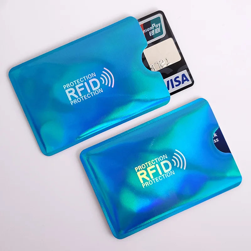 A set of blue RFID protection card sleeves and a credit card are displayed on a white background.