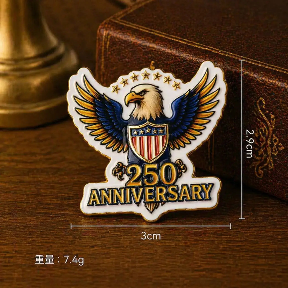 A vintage American eagle lapel pin featuring the USA flag design and the text 250 Anniversary, displayed on a wooden surface.
