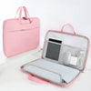 A pink universal laptop sleeve case for 11-16 inch notebooks, shown open with a laptop and mouse inside.