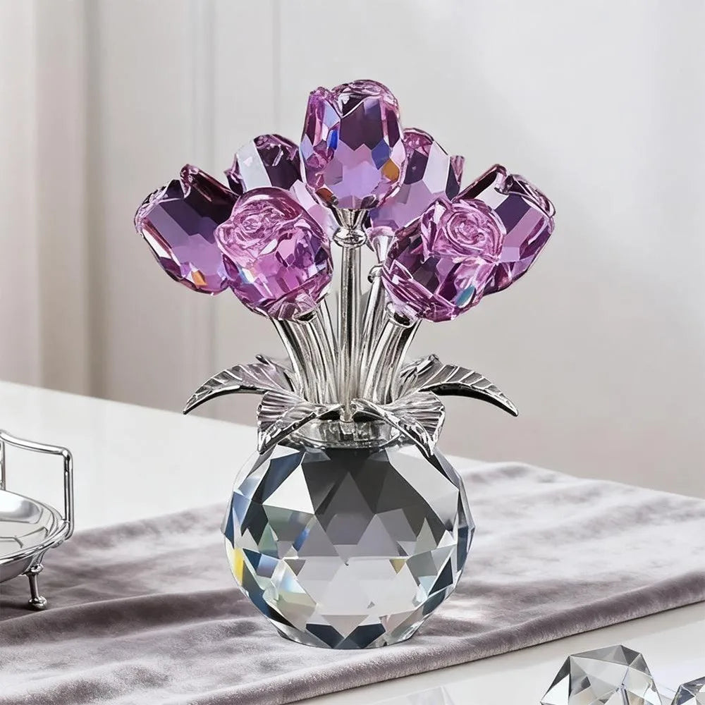 A crystal sculpture featuring a bouquet of purple and pink reflective roses displayed in a clear glass vase.