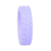 A purple silicone luggage wheel protector with textured grips.