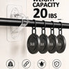Black curtain rod brackets with 5lb capacity hanging from a white wall, showing features like waterproof and scratch resistan