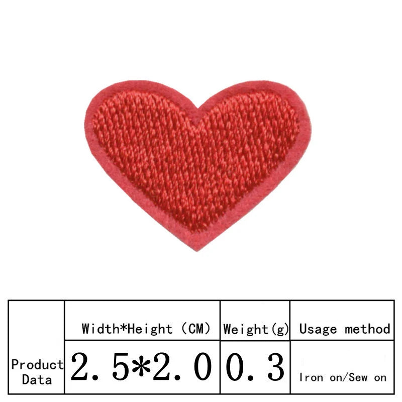 A red heart shaped iron-on patch with a textured surface.