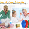 A woman is using a small eye needle threader set for sewing tasks with other individuals.
