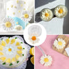 A collection of white daisy silicone molds for crafting flowers and decorations.