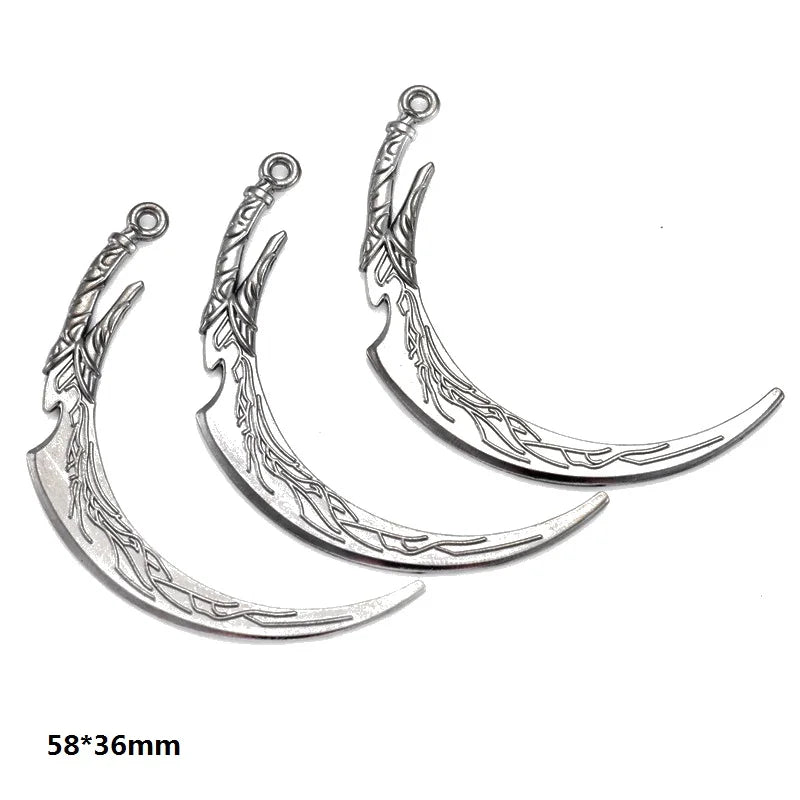 Silver gun-shaped charms for DIY jewelry making featuring intricate leaf designs
